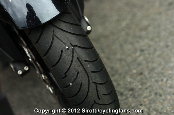 http://www.cyclingfans.net/2012/images/2012_tour_de_france_stage14_foix_moto_tacks_tires1a.jpg