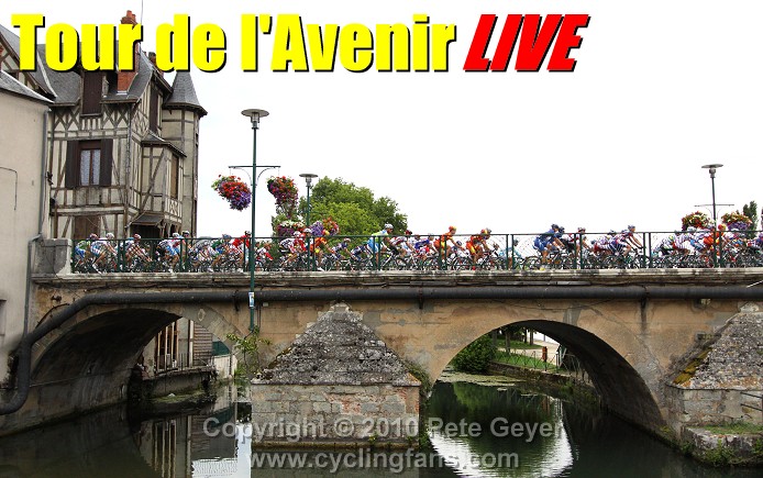 Thumbnail Credit (cyclingfans.com) Pete Geyer: The peloton crosses the rue Voltaire bridge in Vierzon at the start of Stage 1, 2010 Tour de l'Avenir. photo Copyright � 2010 Pete Geyer/www.cyclingfans.com
