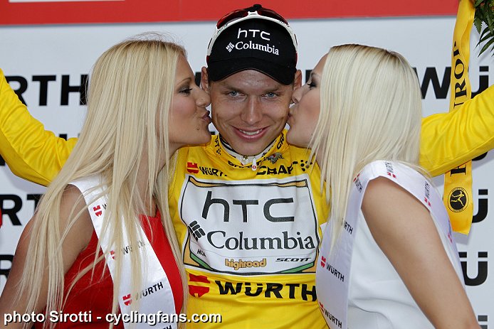 New race leader Tony Martin (Team HTC-Columbia) and podium girls.